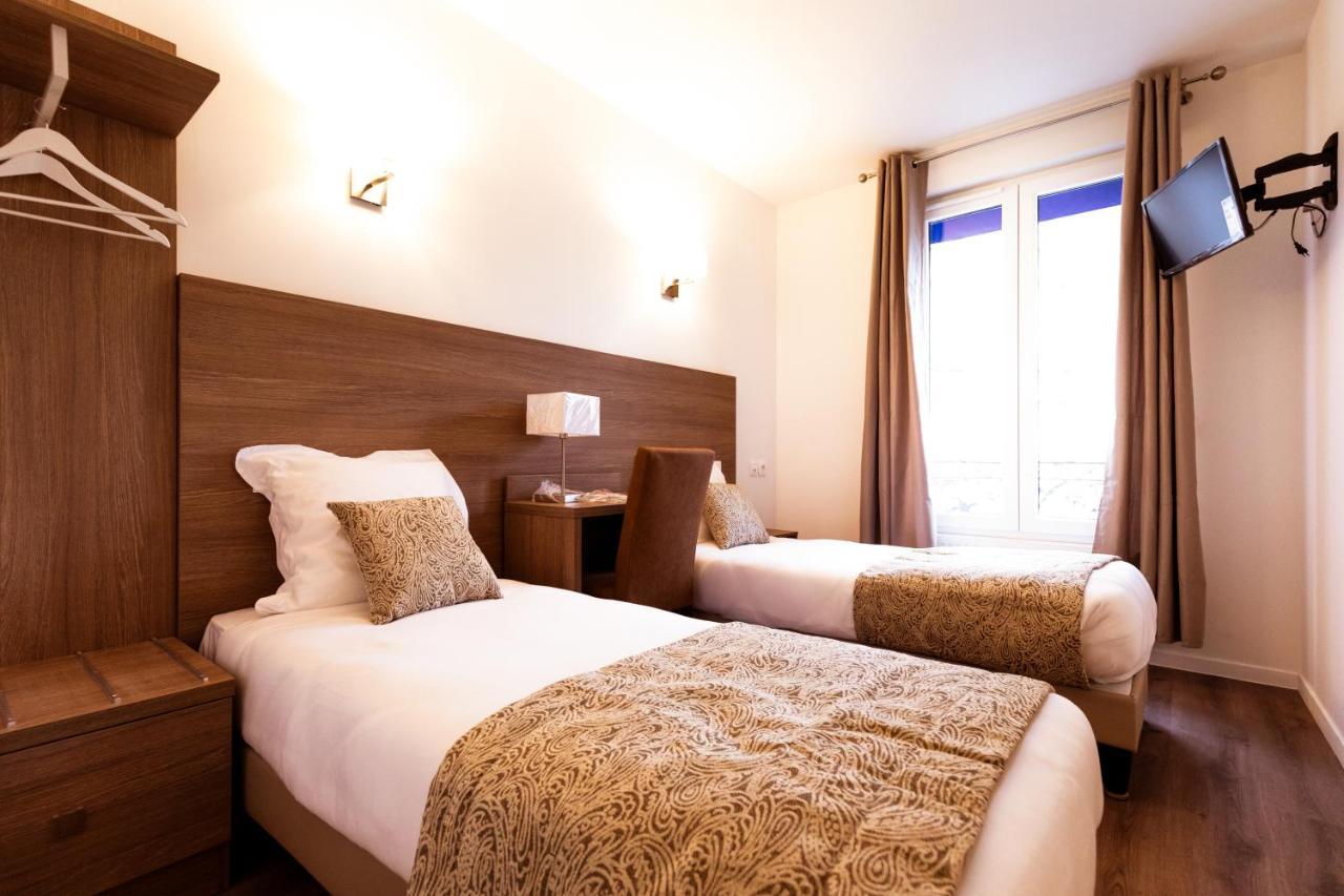 Le Theatre Hotel Suresnes Bagian luar foto