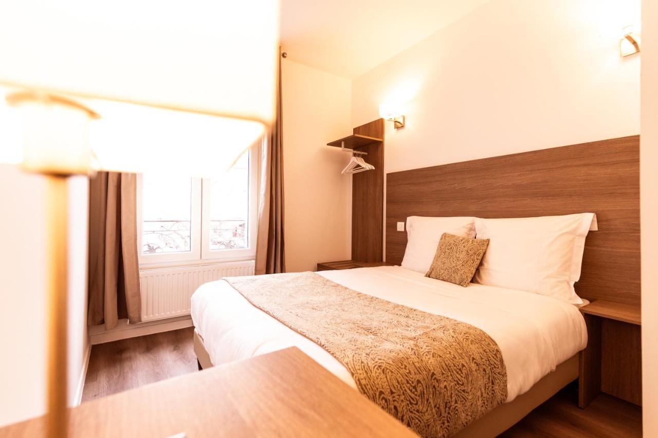 Le Theatre Hotel Suresnes Bagian luar foto